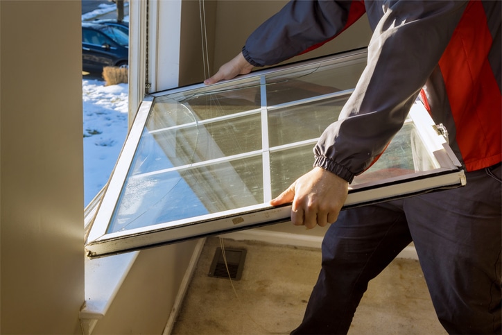 Worker removing windows